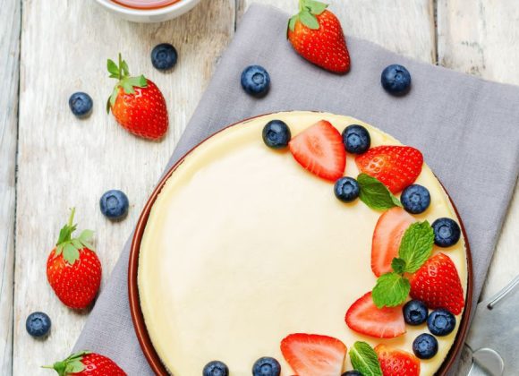 A slice of authentic Italian ricotta cheesecake with a golden top.